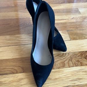 Pointed black heels